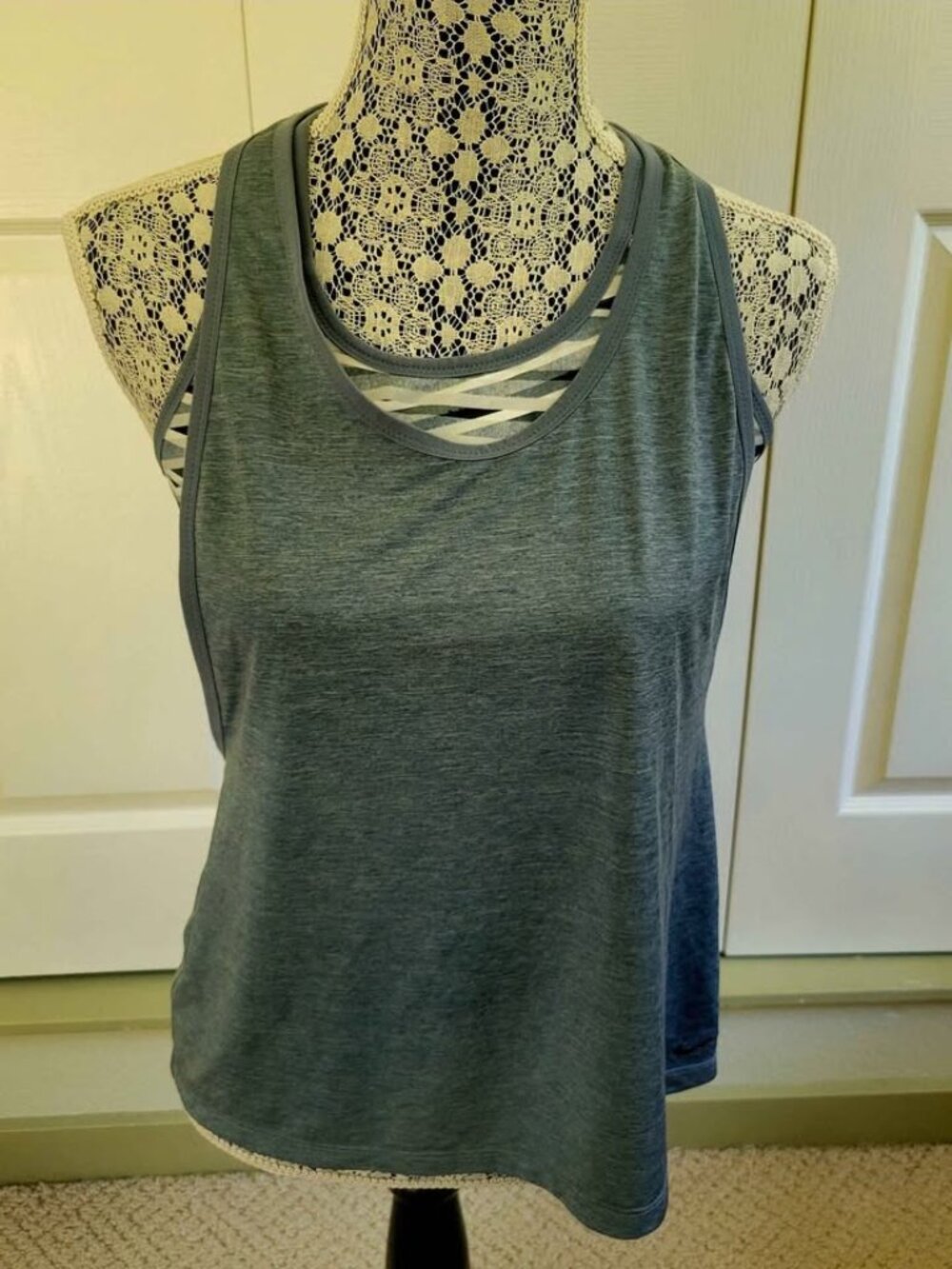 Nike Pro Inside Loose Tank Top Featuring A Heathered Gray Design